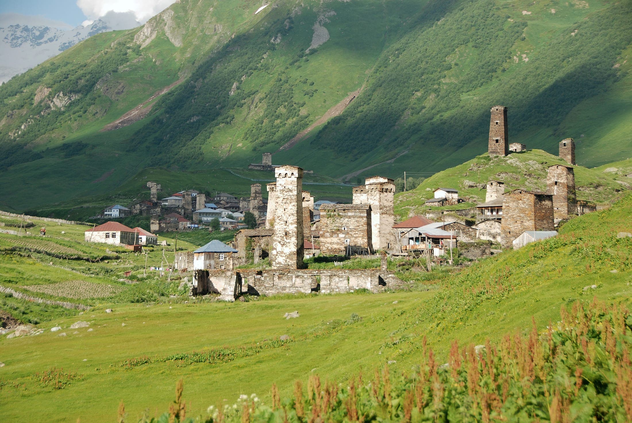 Ushguli village with Svan stone towers and mountain backdrop, Svaneti, Georgia