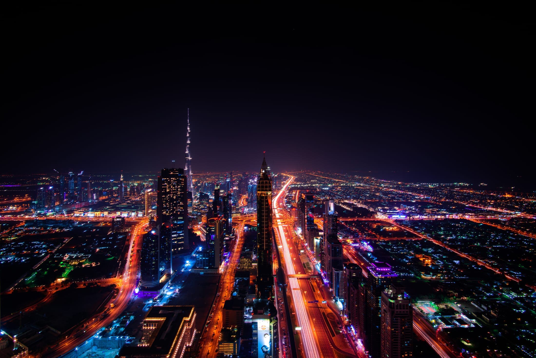 Aerial view of the Downtown Dubai district, showing the cluster of towers and boulevards around Burj Khalifa